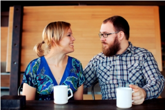 Couple having a hot drink together