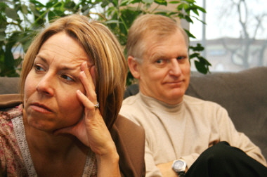 Couple sitting next to each other