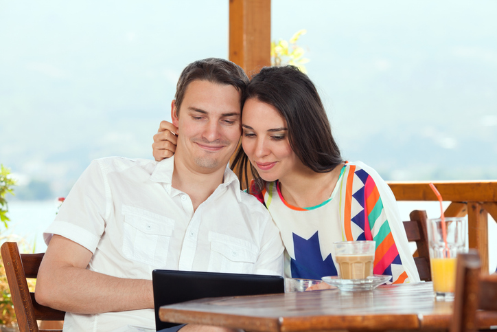 Couple smiling during virtual therapy